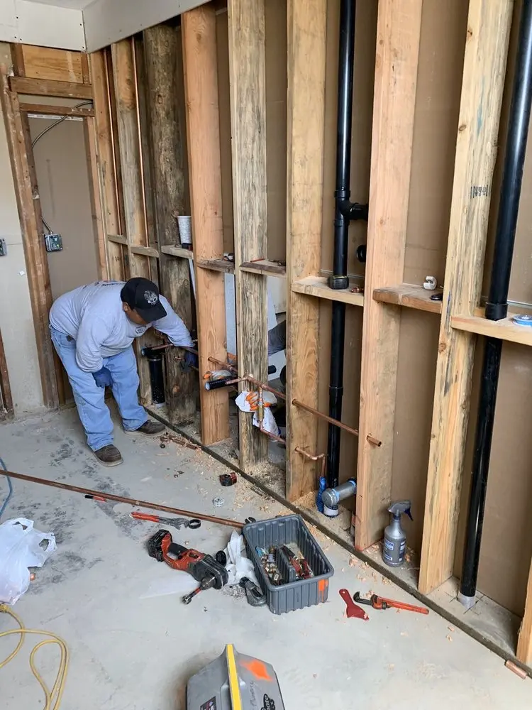 Commercial rough-in plumbing for Water Heater Replacement in Caroline Village